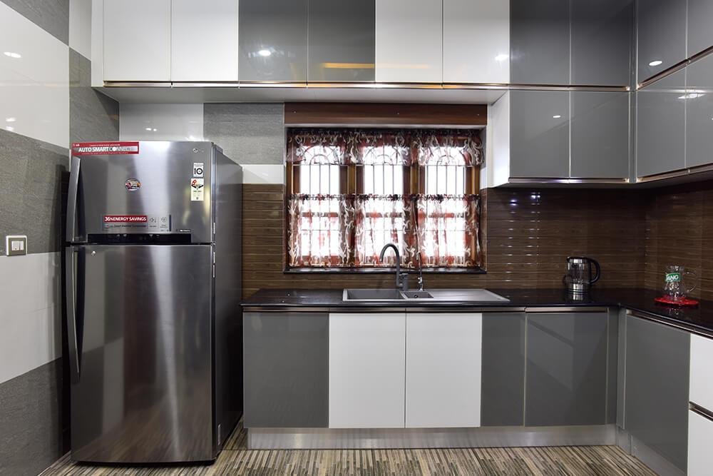 grey-white-high-gloss-kitchen-with-brown-backsplash-parkland-thrissur-kerala