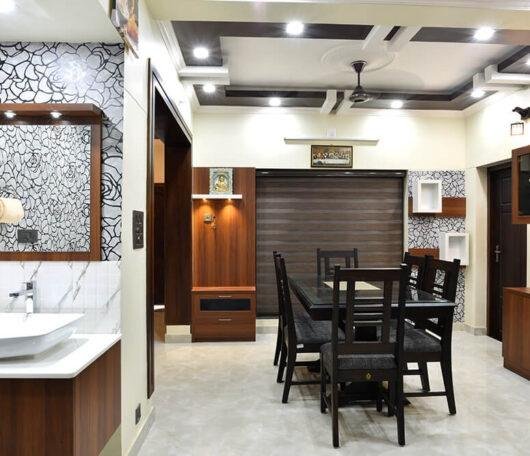 interior-designers-in-thrissur-elegant-dining-under-staircase