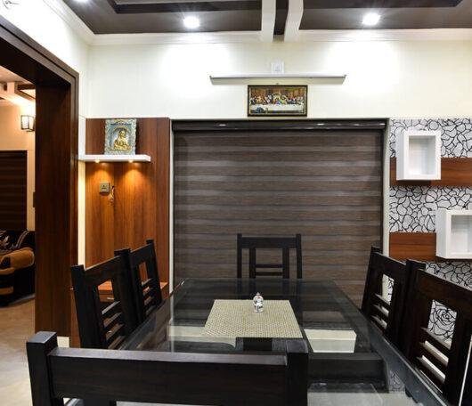 interior-designers-in-thrissur-elegant-dining-under-staircase