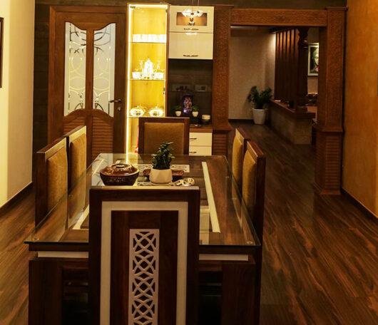 interior-designers-in-thrissur-luxury-apartment-dining-and-living-area-angle1