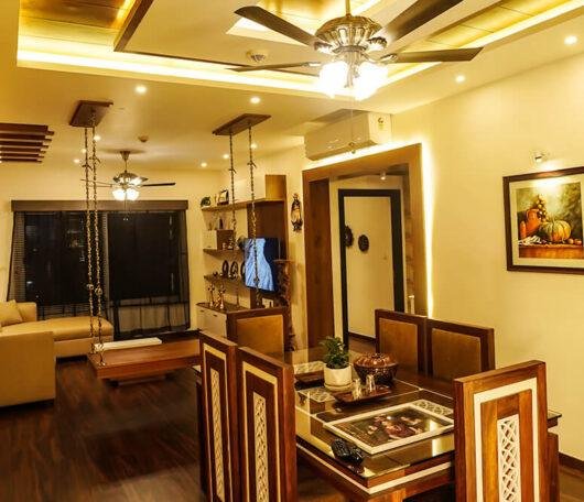 interior-designers-in-thrissur-luxury-apartment-dining-and-living-area-angle2