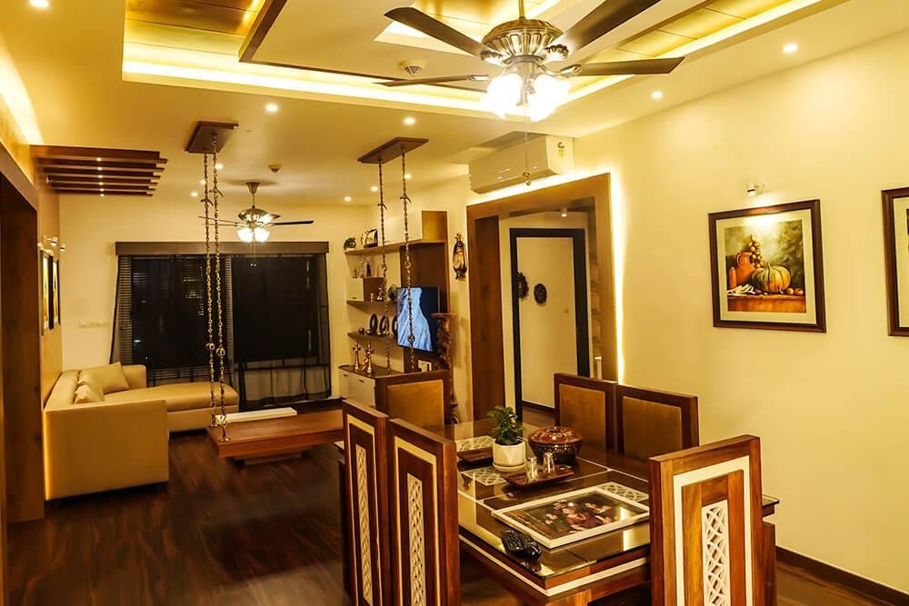interior-designers-in-thrissur-luxury-apartment-dining-and-living-area-angle2