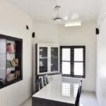 Interior designers in thrissur minimalist dining room with display shelves