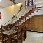 Interior designers in thrissur modern dining room with staircase