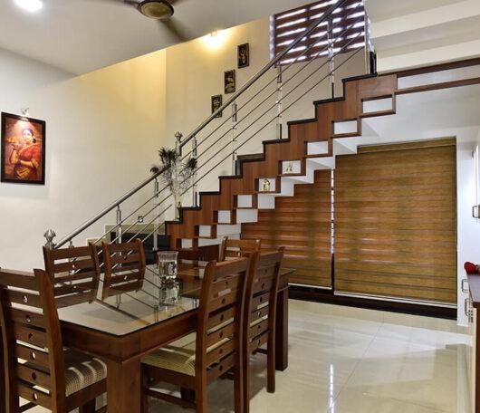 interior-designers-in-thrissur-modern-dining-room-with-staircase-angle2