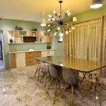 Interior designers in thrissur modern minimalist dining space with designer lighting