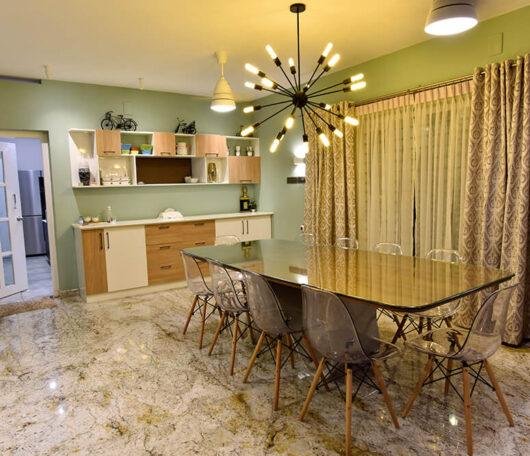 interior-designers-in-thrissur-modern-minimalist-dining-space-with-designer-lighting-angle1