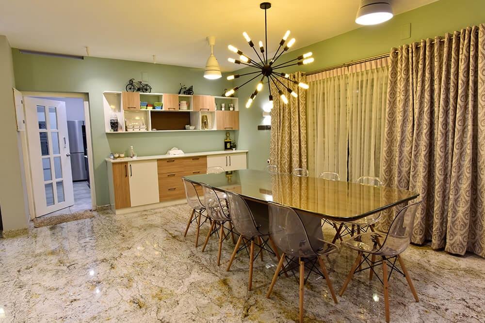 interior-designers-in-thrissur-modern-minimalist-dining-space-with-designer-lighting-angle1