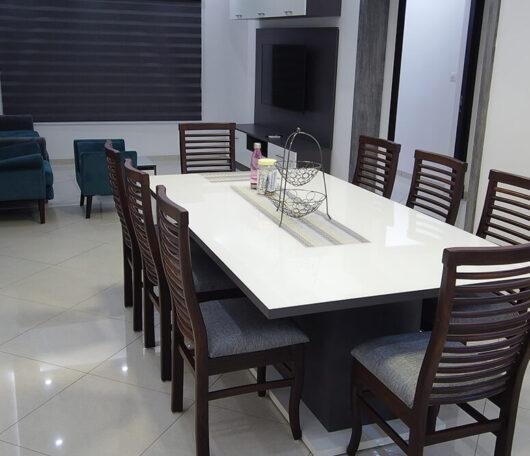 interior-designers-in-thrissur-modern-white-dining-table-angle1