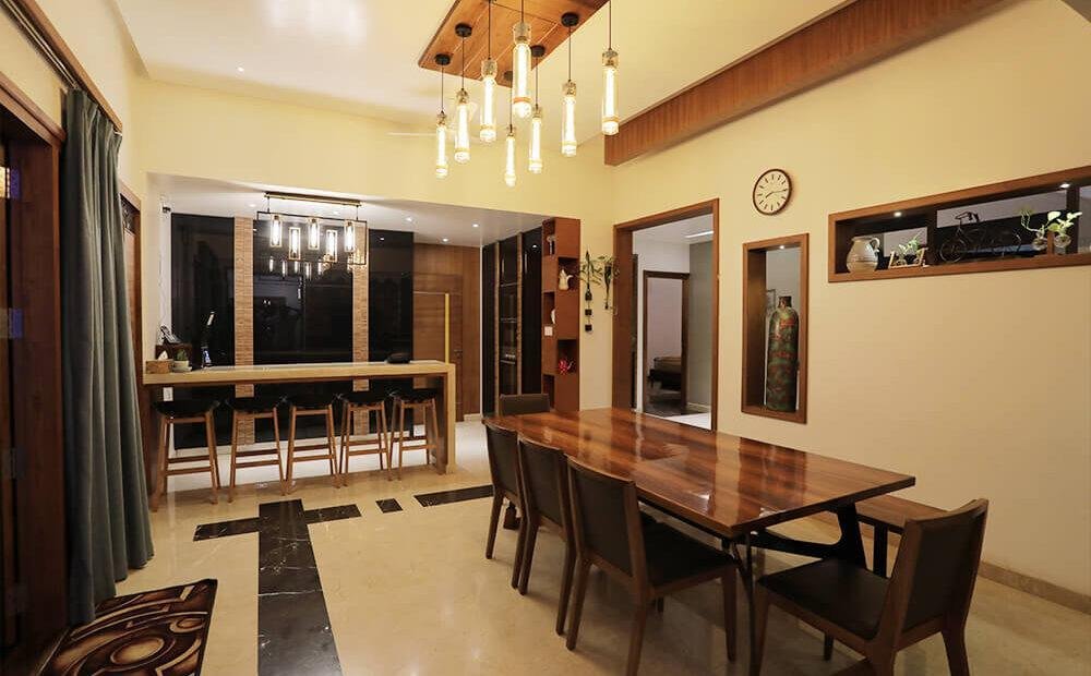 interior-designers-in-thrissur-wood-finish-dining-and-bar-area-angle1
