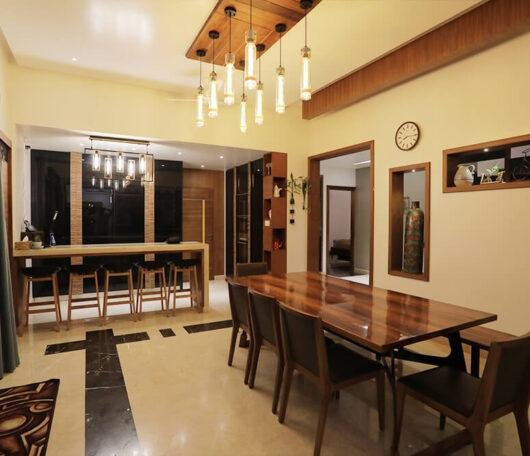 interior-designers-in-thrissur-wood-finish-dining-and-bar-area-angle1