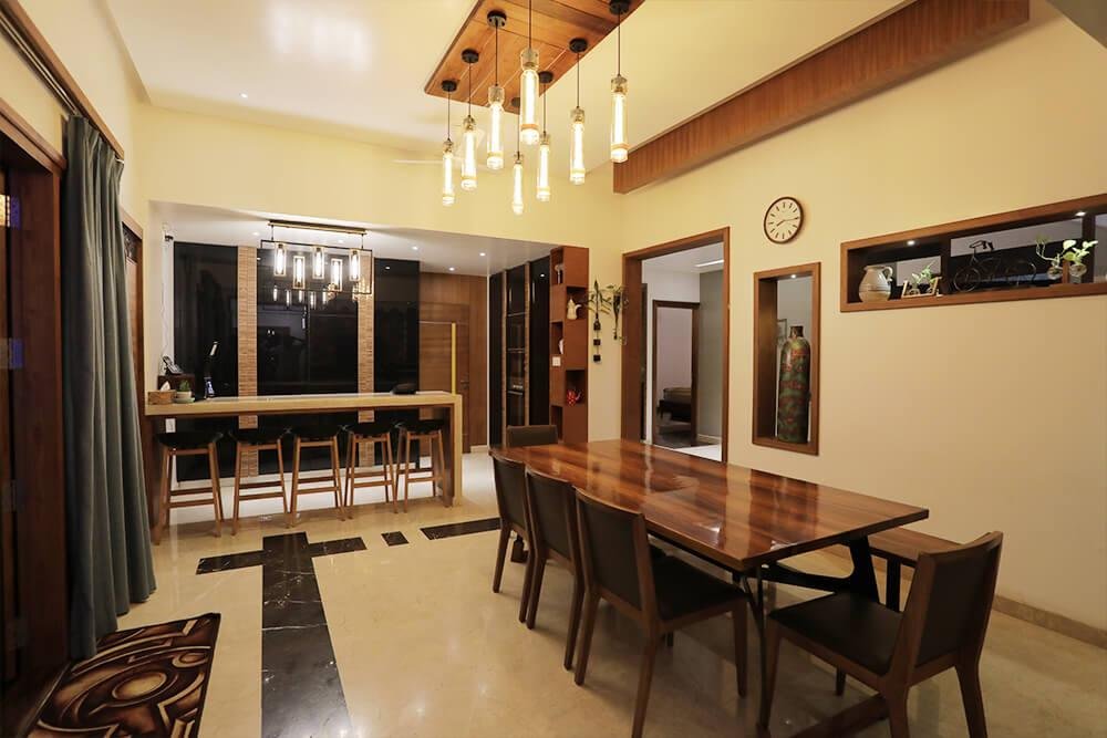 interior-designers-in-thrissur-wood-finish-dining-and-bar-area-angle1