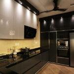 Luxury black glossy kitchen design parkland thrissur kerala