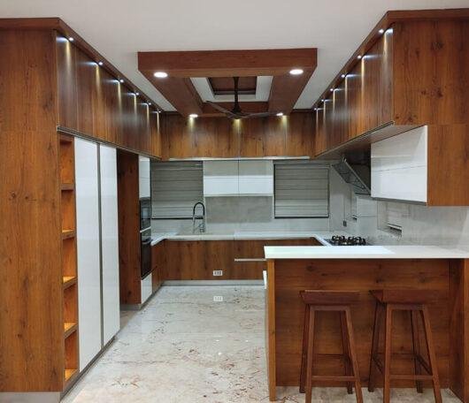 luxury-wood-themed-open-kitchen-parkland-thrissur-kerala