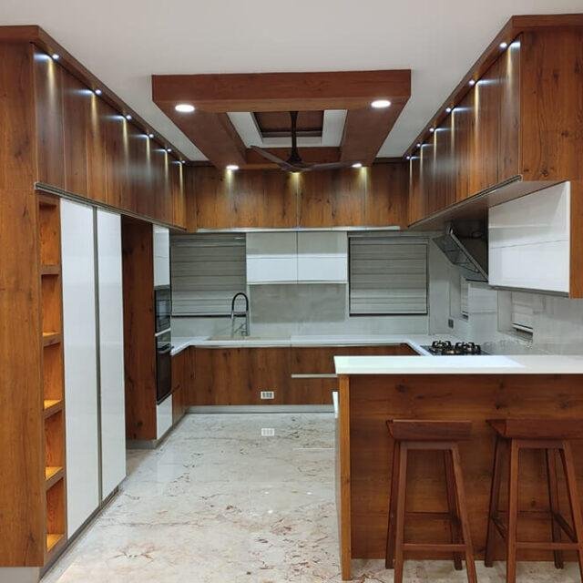 luxury-wood-themed-open-kitchen-parkland-thrissur-kerala