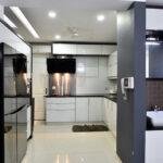 Sleek white modern kitchen design parkland thrissur kerala
