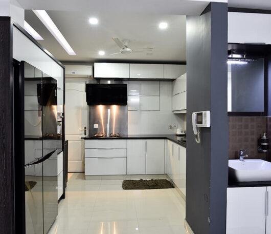 sleek-white-modern-kitchen-design-parkland-thrissur-kerala