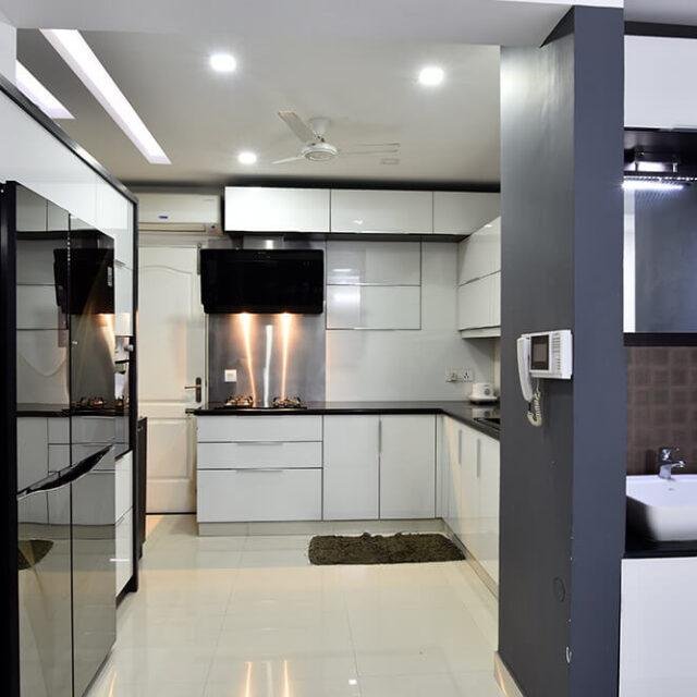 sleek-white-modern-kitchen-design-parkland-thrissur-kerala