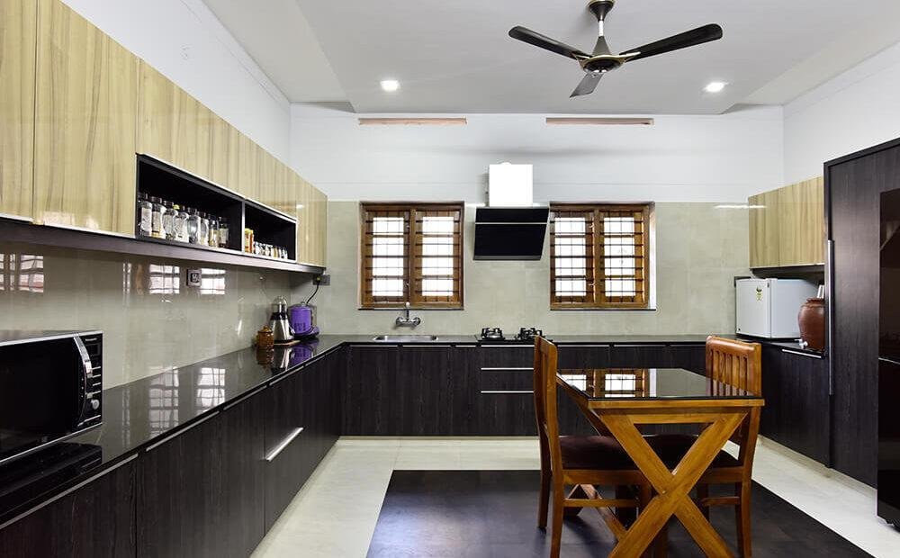 two-tone-wood-black-modular-kitchen-parkland-thrissur-kerala