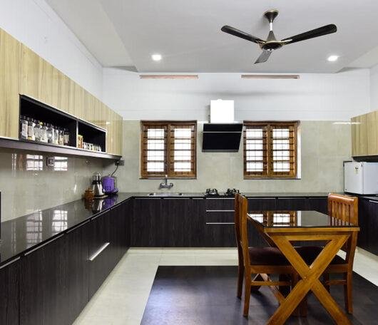 two-tone-wood-black-modular-kitchen-parkland-thrissur-kerala