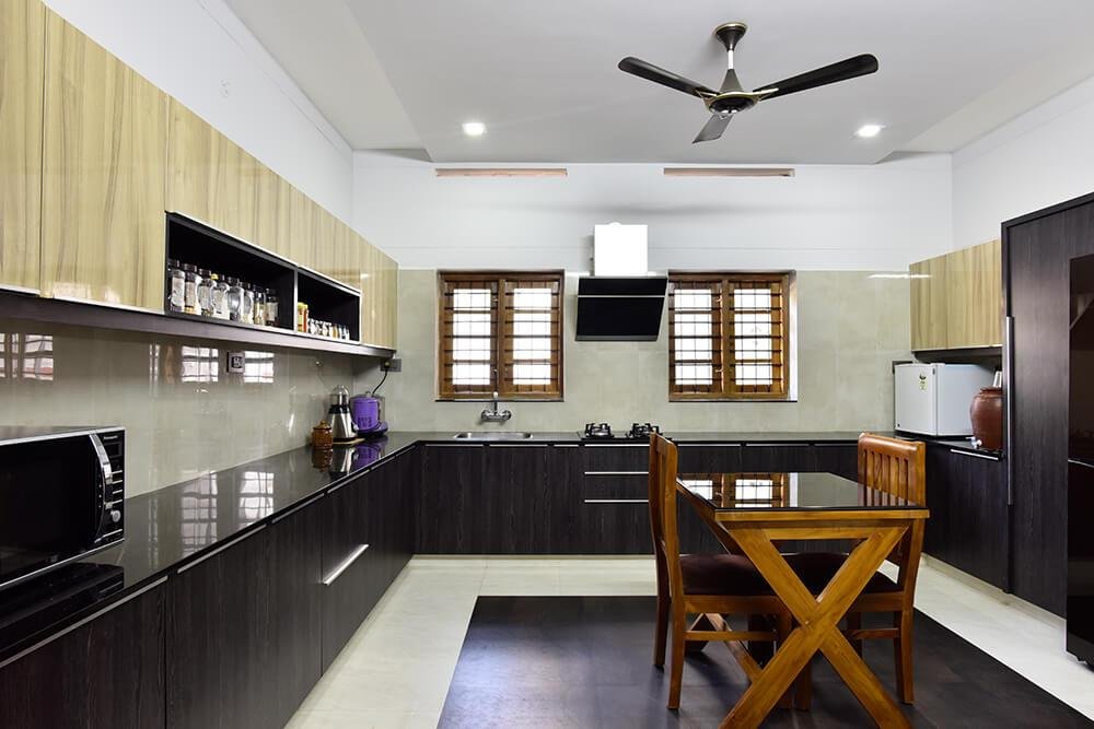 two-tone-wood-black-modular-kitchen-parkland-thrissur-kerala