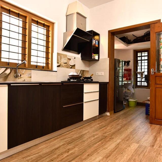 wood-floor-dark-brown-white-kitchen-parkland-thrissur-kerala